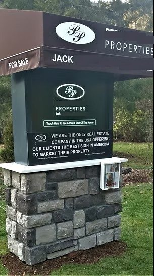 Complete installed cellular virtual-tour kiosk mounted in a freestanding property sign